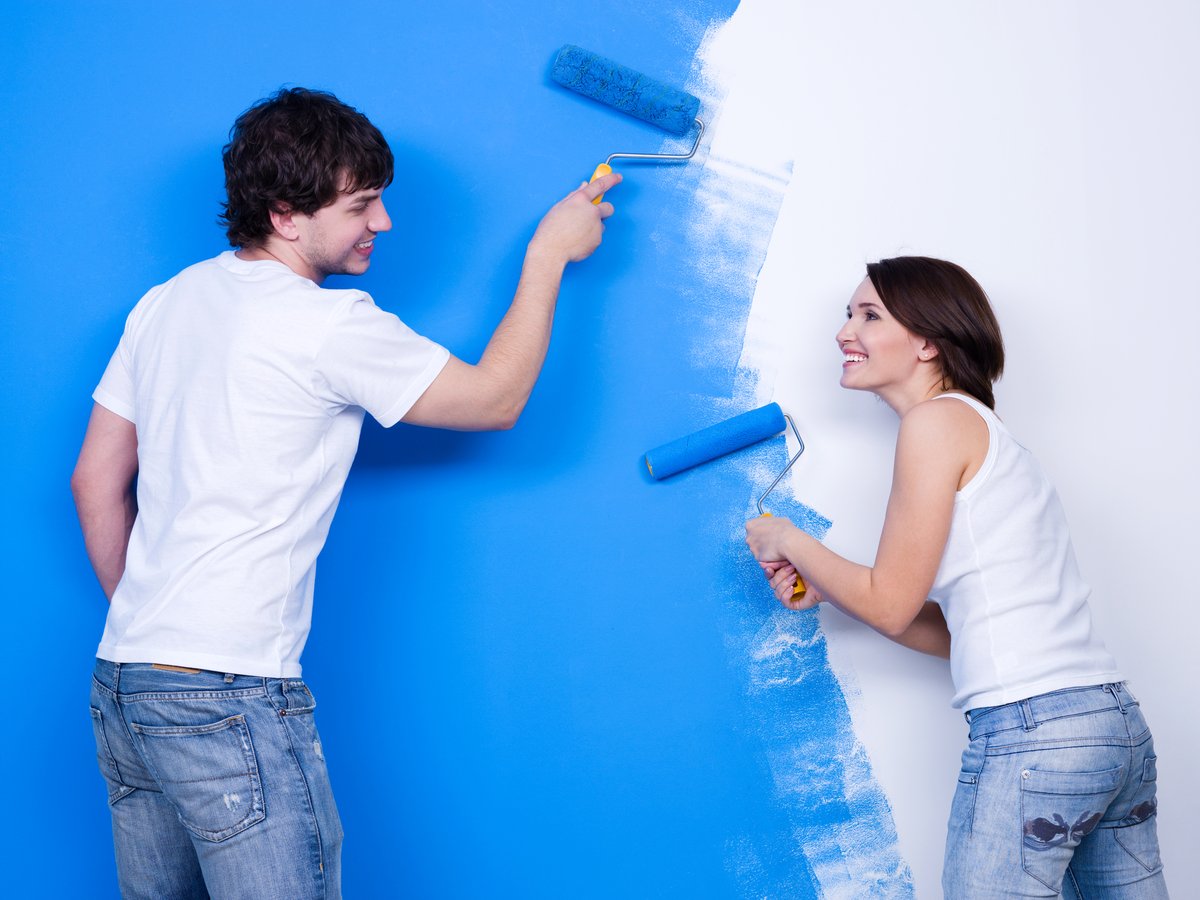 Happy brushing the wall